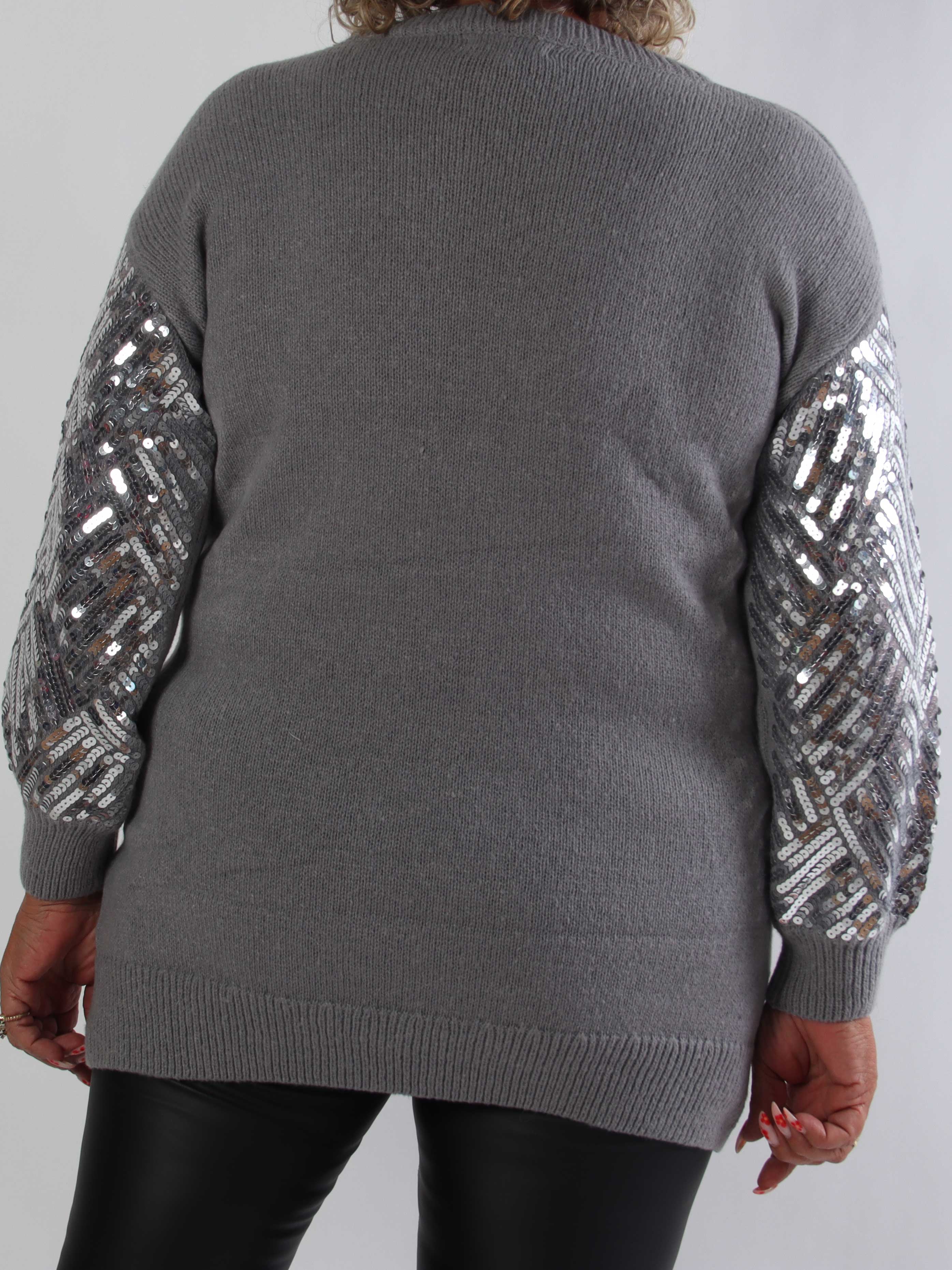 Astoria - Blød plus size strikbluse med fine pailletter på fronten