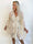 Carmela - Feminin semi-transparent tunikakjole med fine broderede detaljer