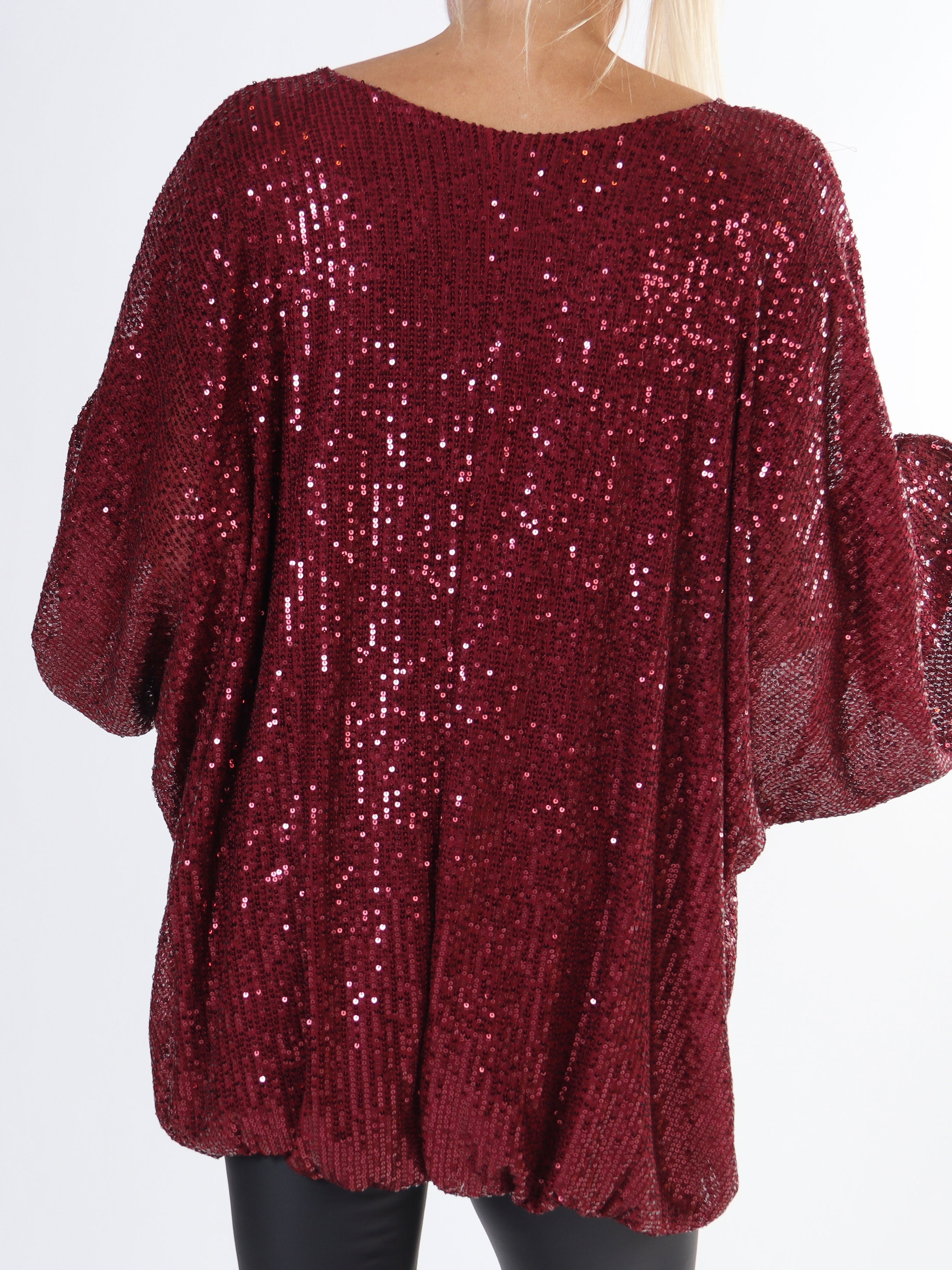 Destiny - Paljettblus med fladdermusärmar i plus size-modell