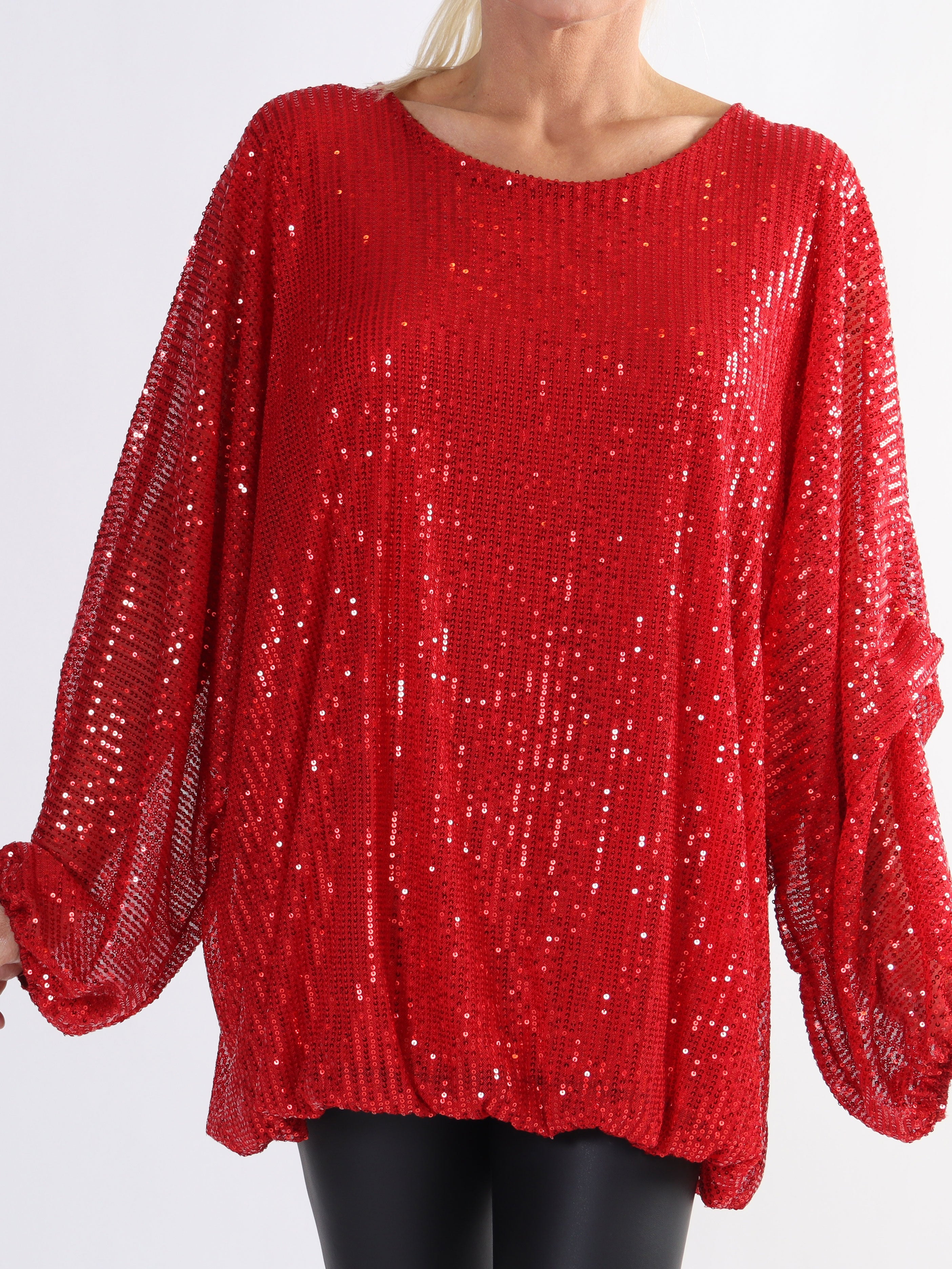 Destiny - Paljettblus med fladdermusärmar i plus size-modell