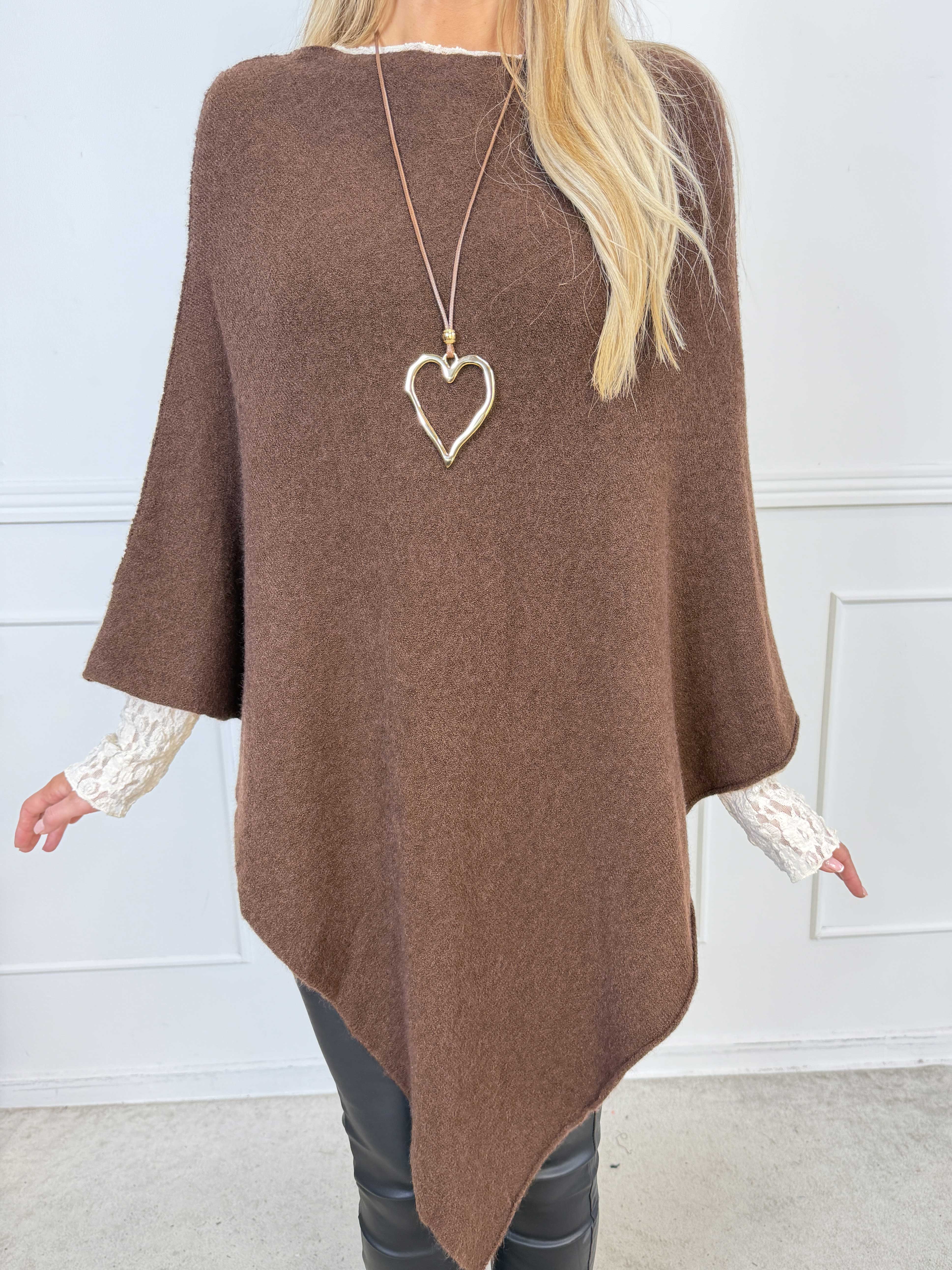 Duff - Söt och elegant poncho i en enkel, enfärgad design och snygg trekantsform