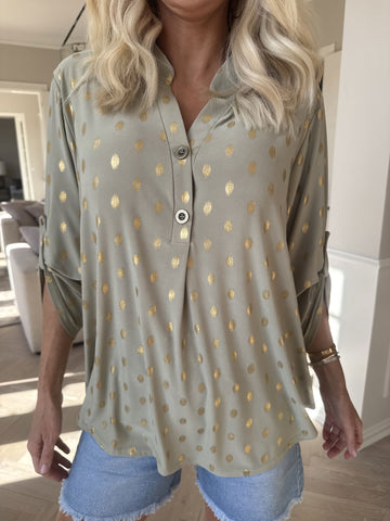 Ebba Gold Shirt - Elastisk blus med guld prickar