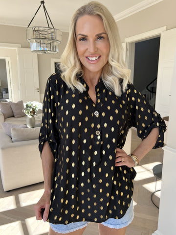 Ebba Gold Shirt - Elastisk blus med guld prickar