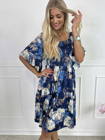 Elna Beautiful Short - Blomstret elastisk kjole med smock over brystet