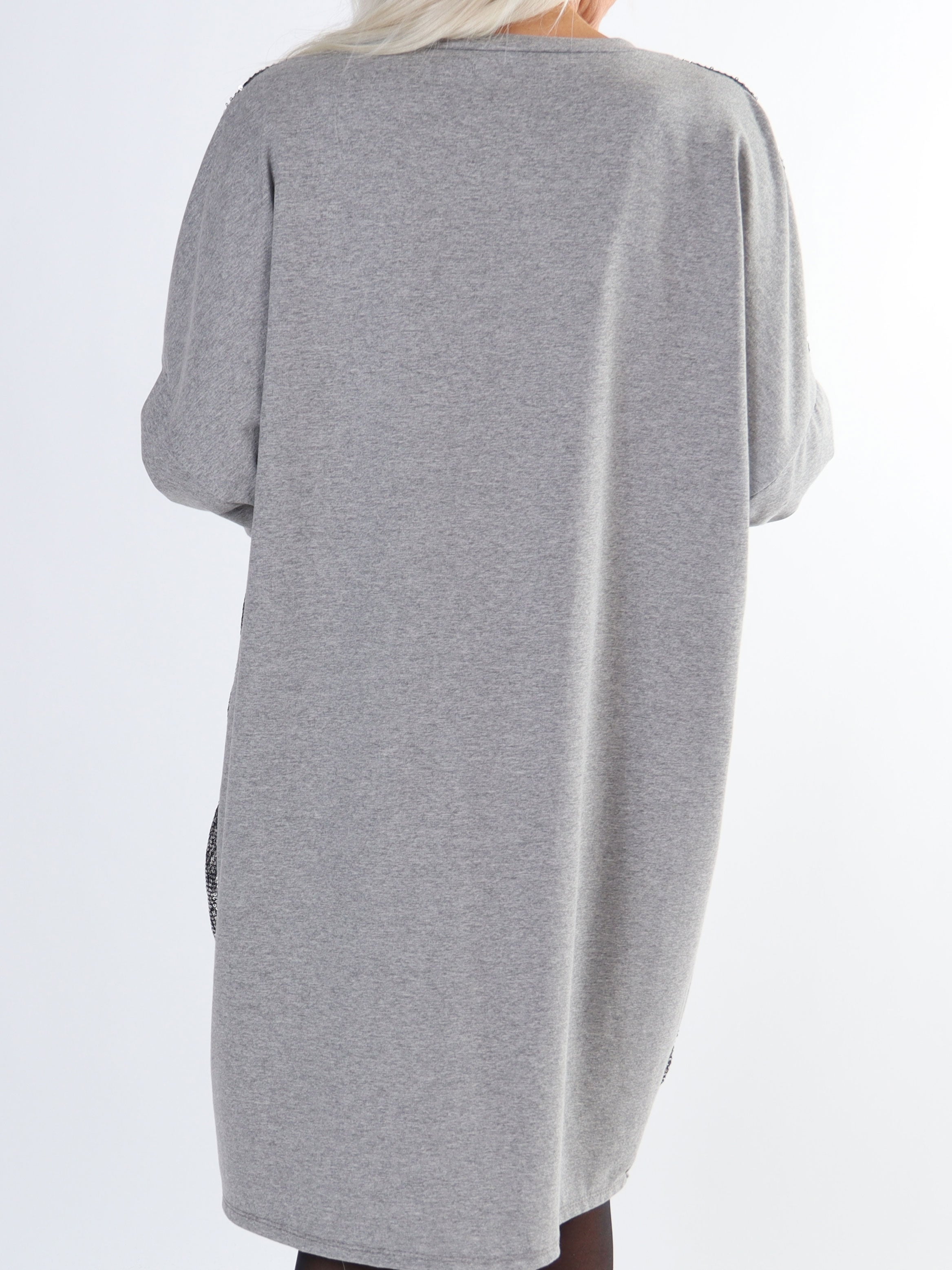 Eria - Klänning i stora storlekar med paljetter framtill