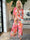 Pams Print Jumpsuit - Stretchig mönstrad jumpsuit med guldfärgat damm
