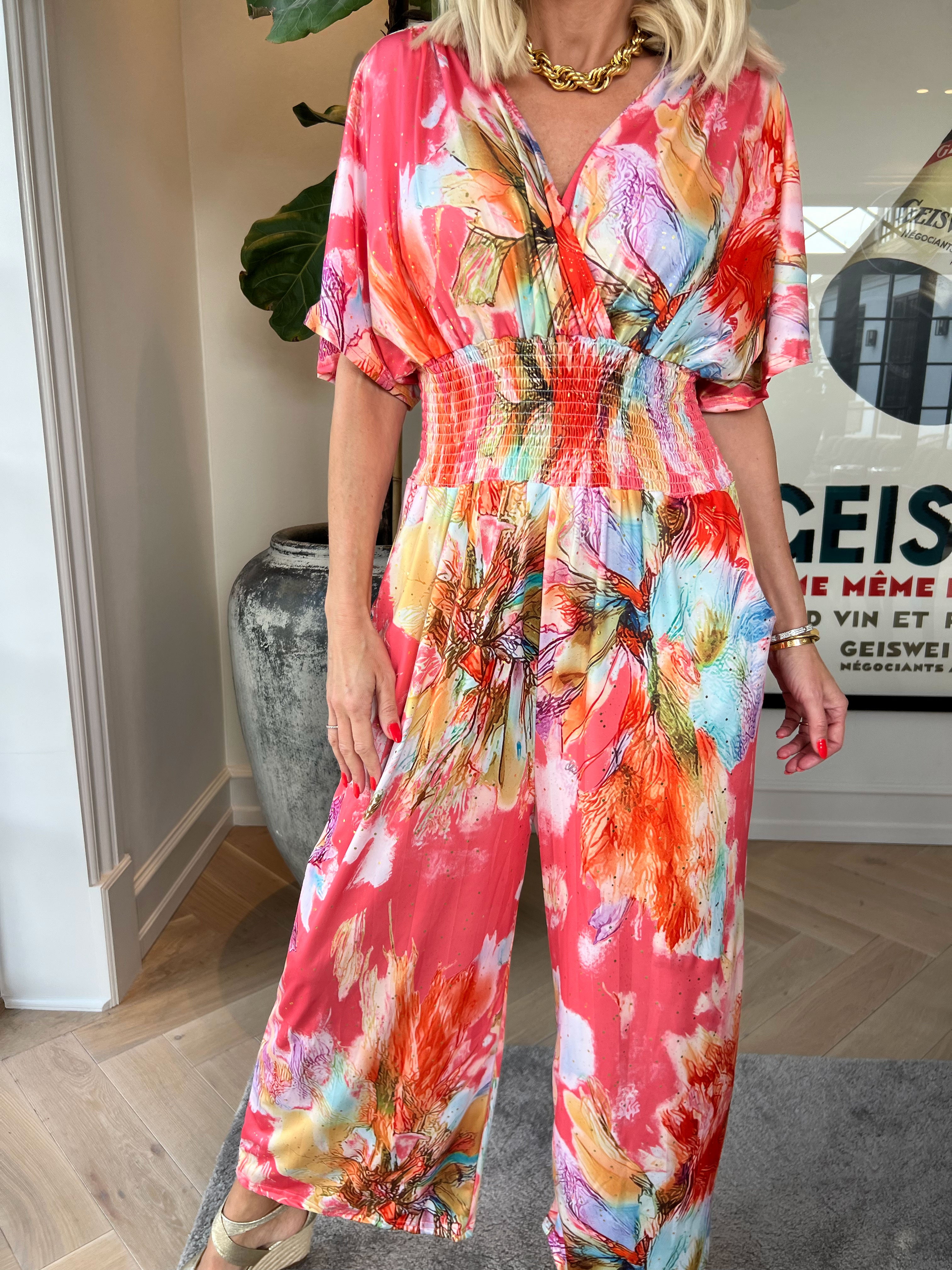 Pams Print Jumpsuit - Stretchig mönstrad jumpsuit med guldfärgat damm