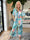 Pams Print Jumpsuit - Stretchig mönstrad jumpsuit med guldfärgat damm