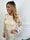 Diamond - Stickad blus med broderade ärmar och volangdetaljer