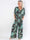 Pams Jumpsuit - Elastisk jumpsuit i plusstorlek med bladmönster