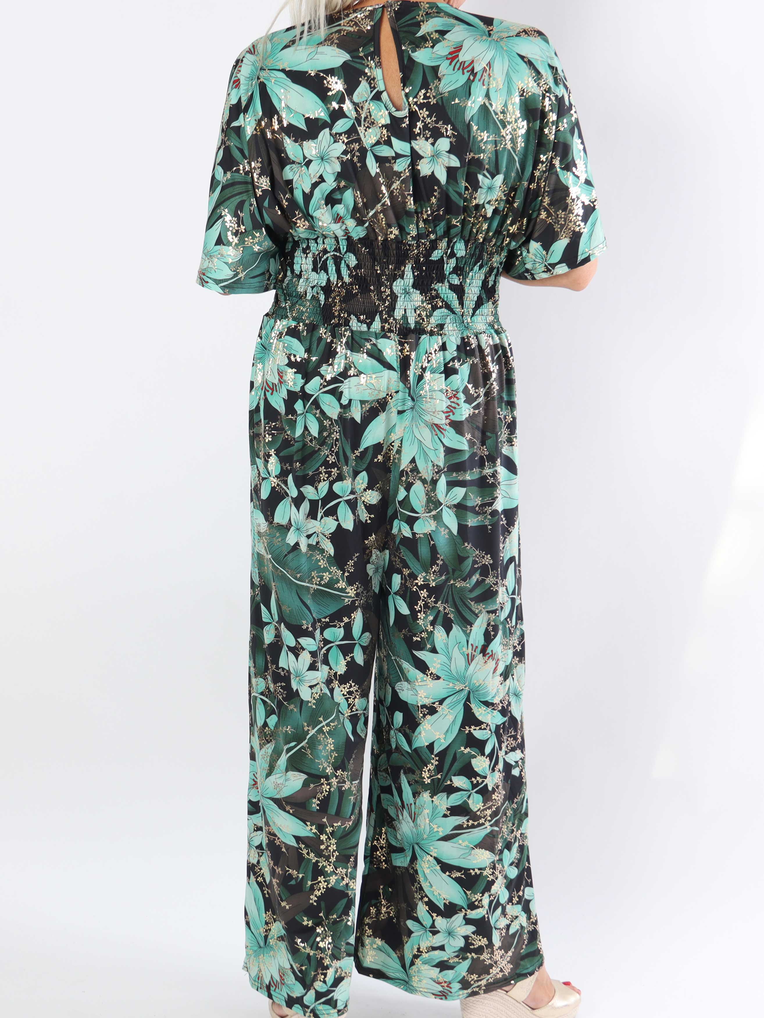 Pams Jumpsuit - Elastisk jumpsuit i plusstorlek med bladmönster