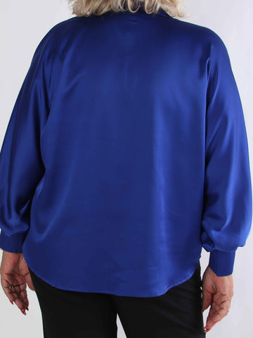 Feliciti - Glansig plus size skjorta med fladdermusärmar