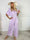 Grace - Stretchig jumpsuit med vita prickar