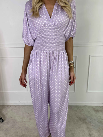 Grace - Stretchig jumpsuit med vita prickar
