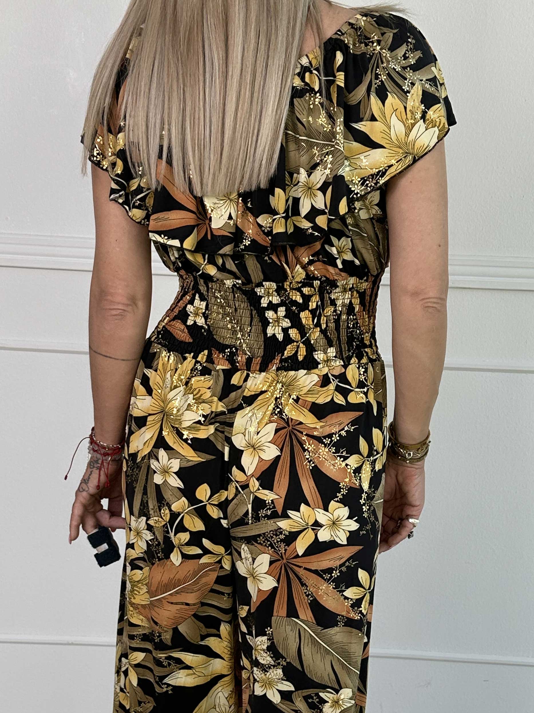 Pams Frill Jumpsuit - Elastisk jumpsuit med smock och volang