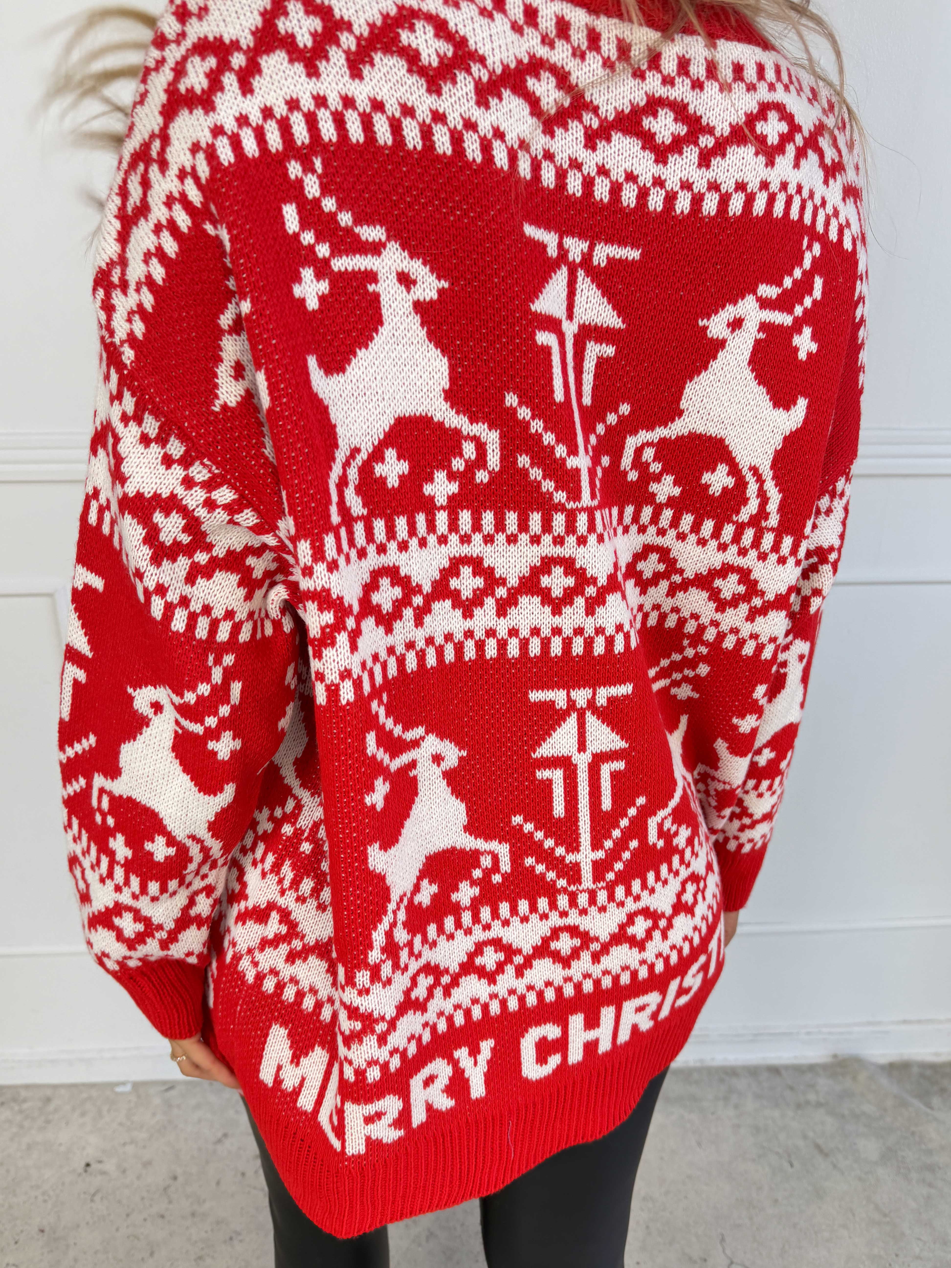 Jingle - Stickad jultröja i plus size med fina renar och texten “MERRY CHRISTMAS”