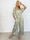 Pams Butterfly Jumpsuit - Elastisk plus size jumpsuit med fjärilsmönster