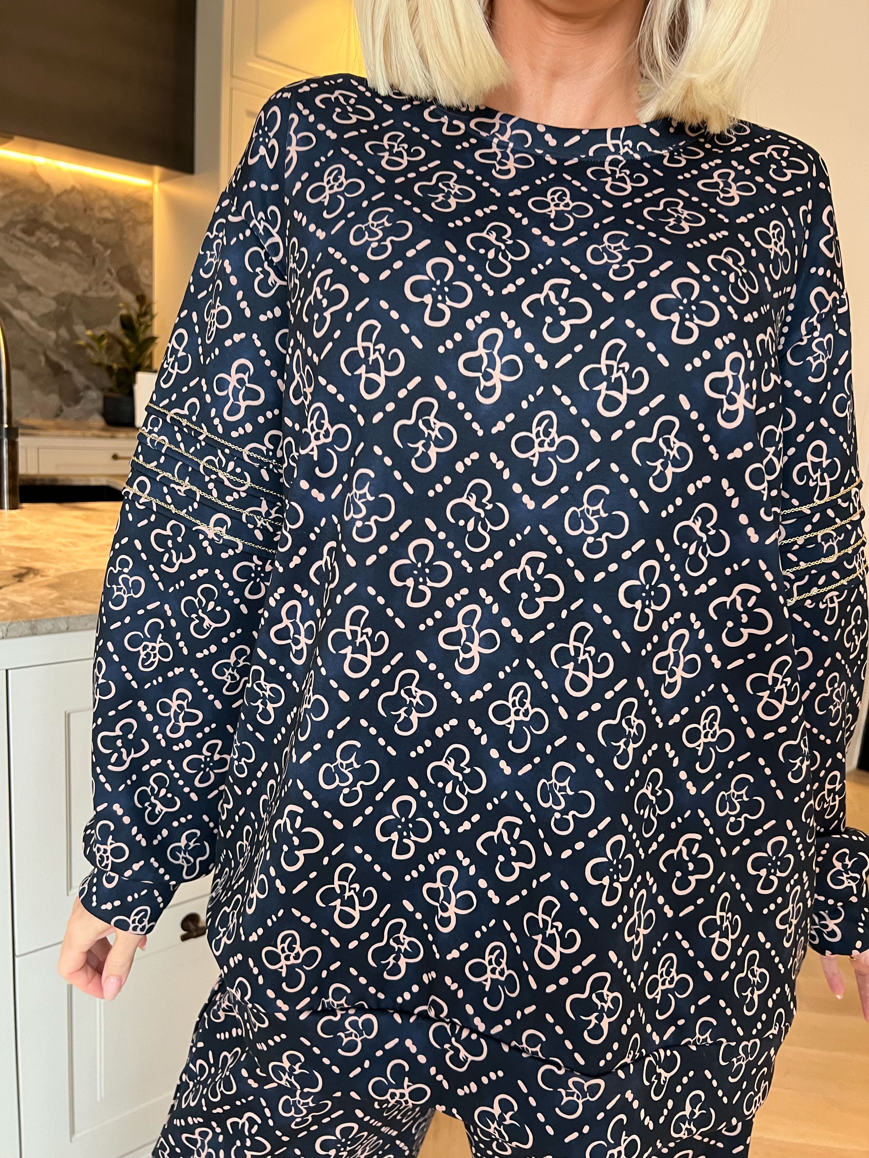 Dream Pattern - Träningsoverall i viskos med trendigt mönster, gulddetaljer och ribbade kanter