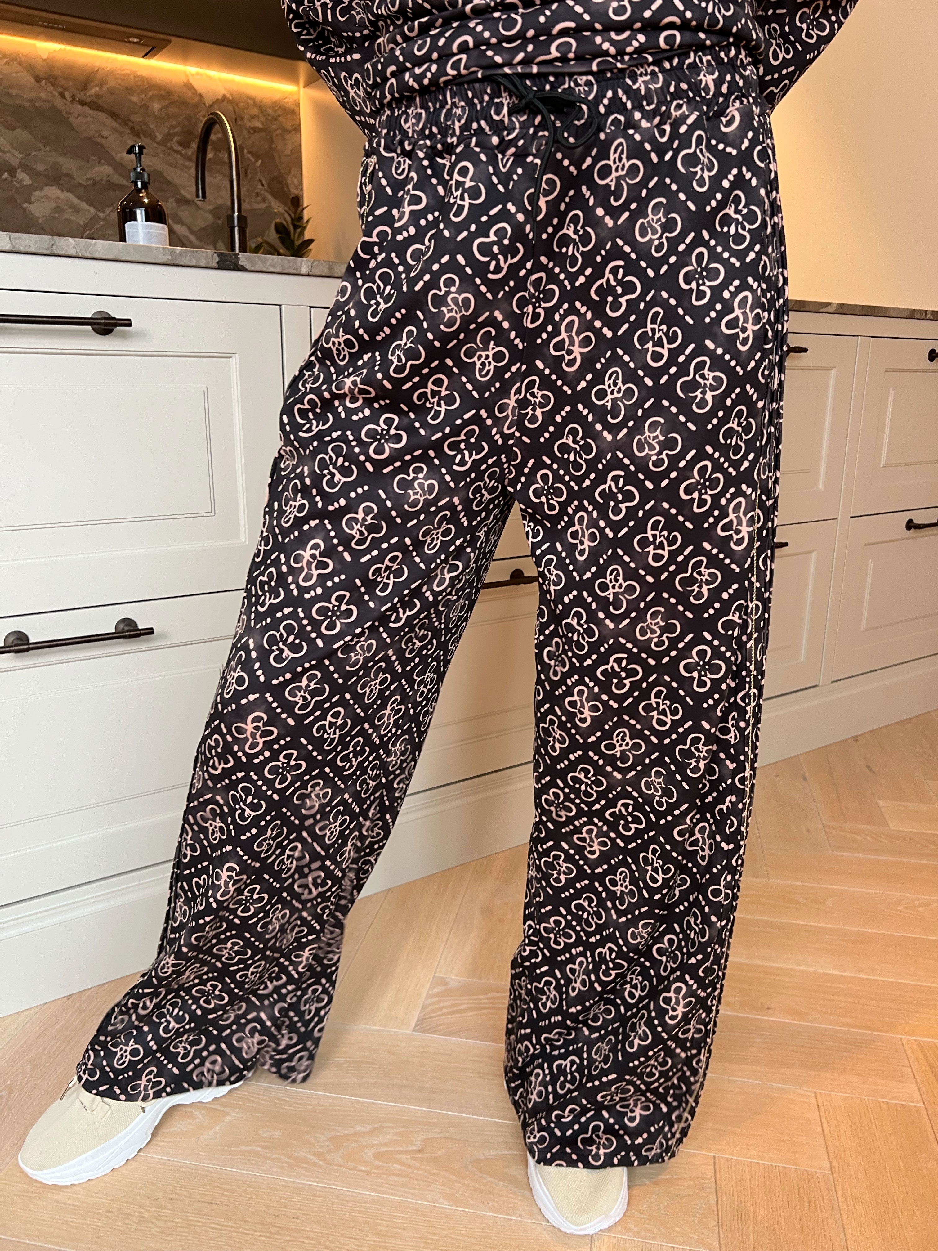 Dream Pattern - Träningsoverall i viskos med trendigt mönster, gulddetaljer och ribbade kanter