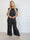 Zina – Elegant plus size set med prickar och veckad design