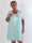 Janina - Blød plus size t-shirtkjole i bomuld med palme på maven