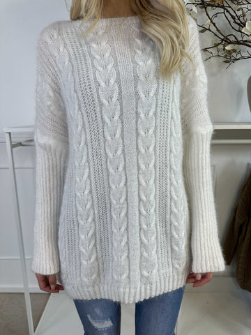 Johanna - Stickad blus i glansig trikå