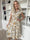 Kelly Floral Sleeveless - Blommig klänning med smockat bröst