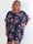 Kenya Fleur - Plus size kjole med et let blomstret chiffonstykke