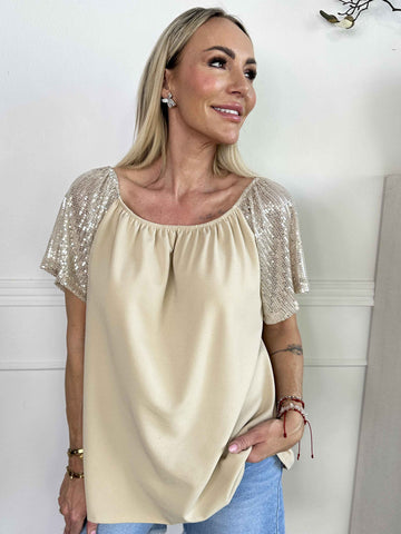 Kim Shirt - Söt och feminin blus med resår och ärmar med glittriga paljetter