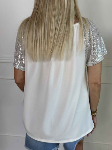 Kim Shirt - Söt och feminin blus med resår och ärmar med glittriga paljetter
