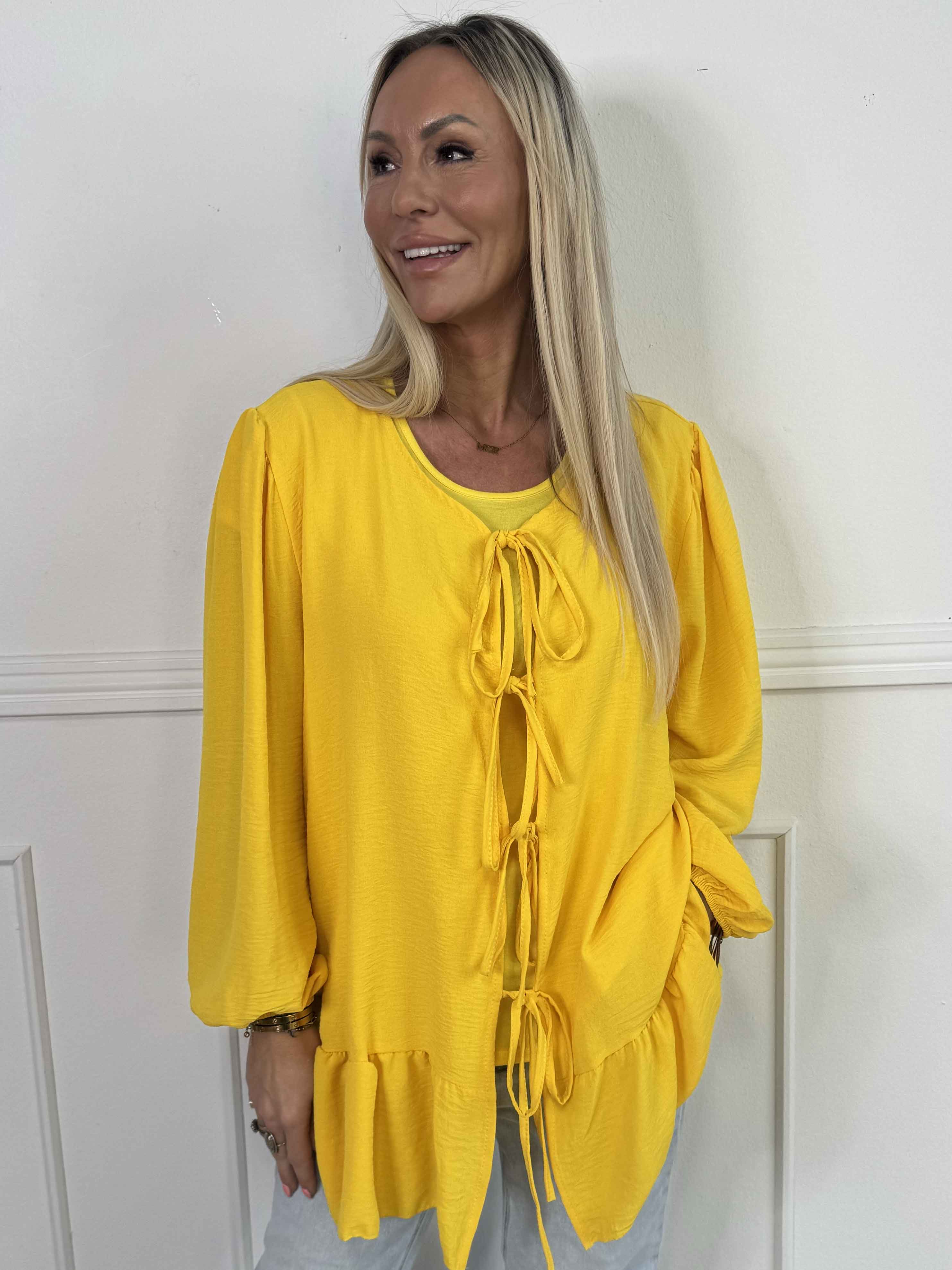 Leslie - Sød tunika i viskose med fine sløjfer foran