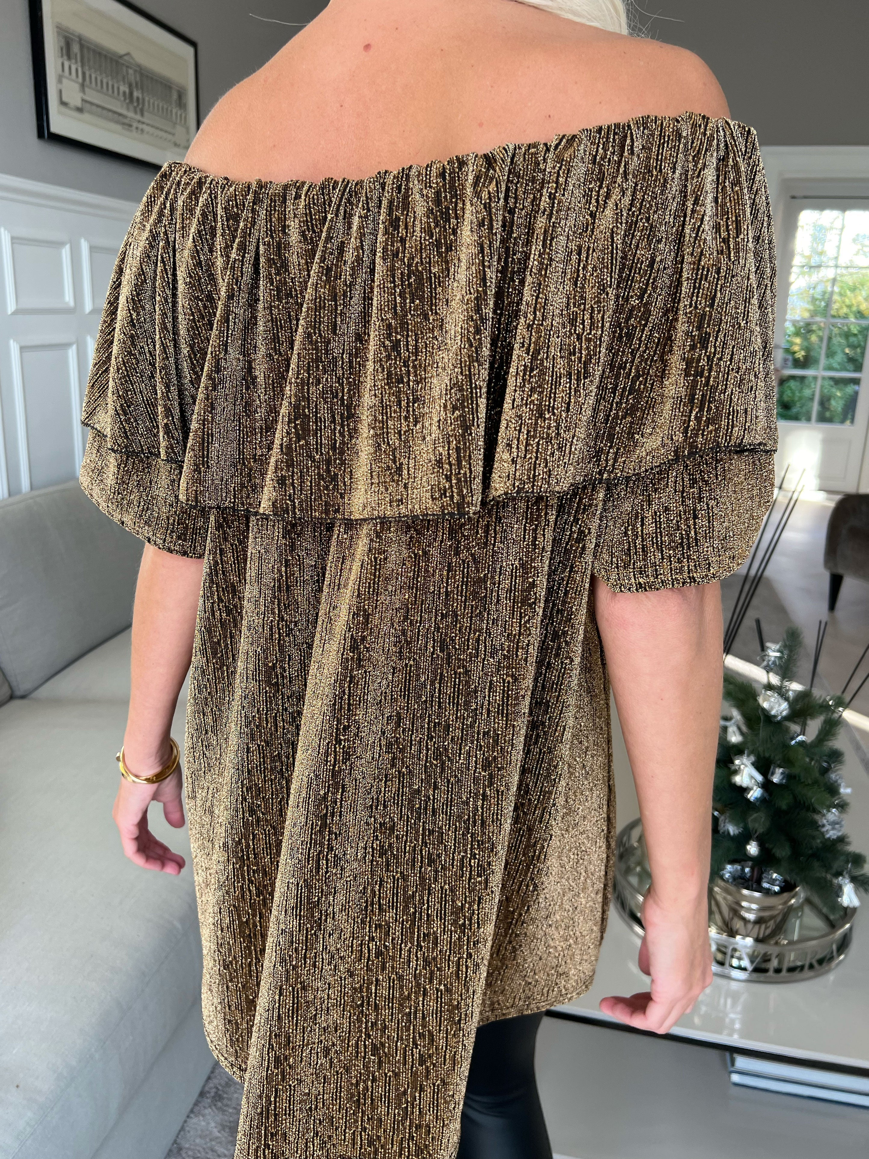 Maily - Off shoulder-blus med glittertrådar