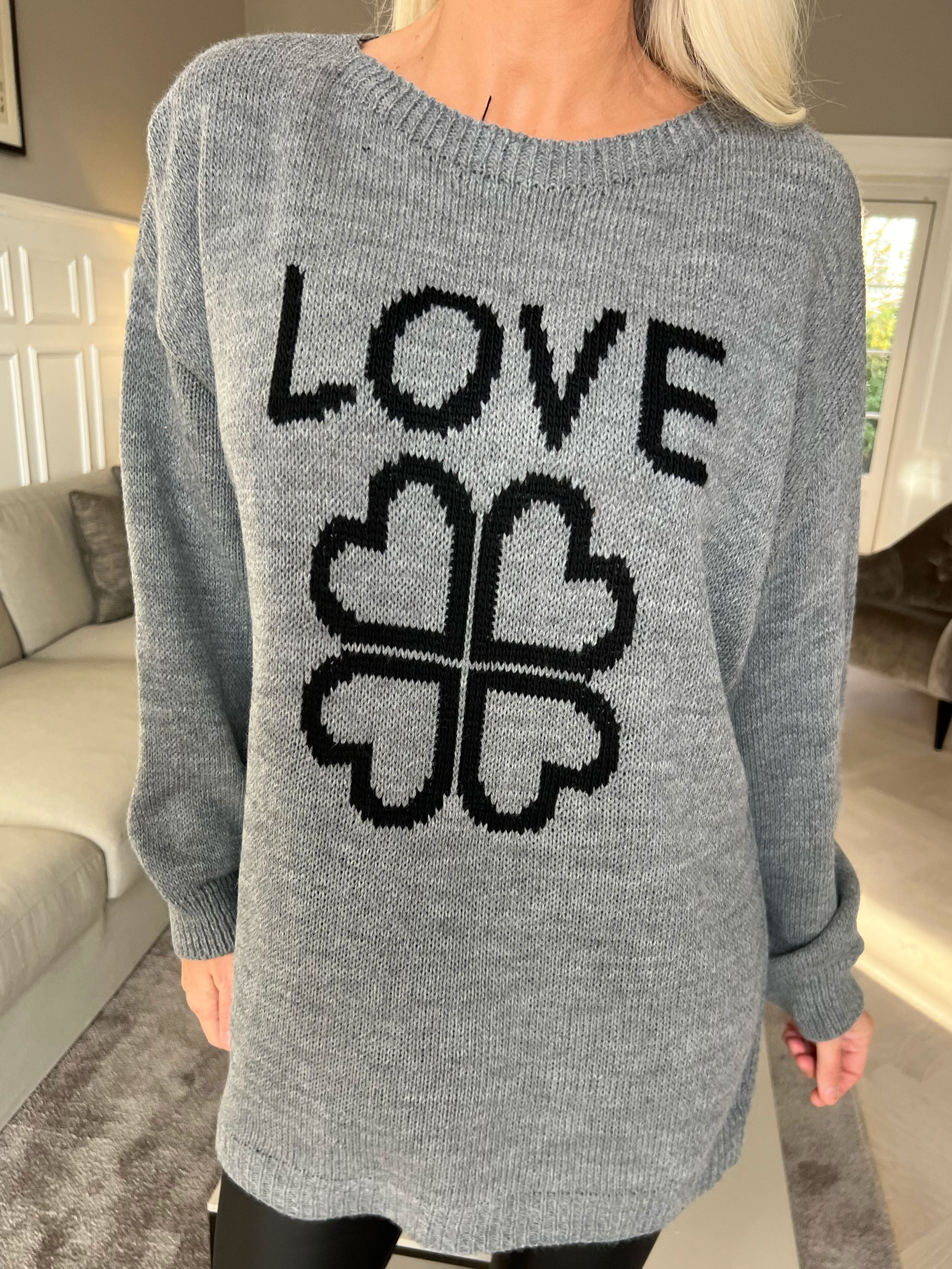 Mia - Stickad blus med fyrklövermotiv