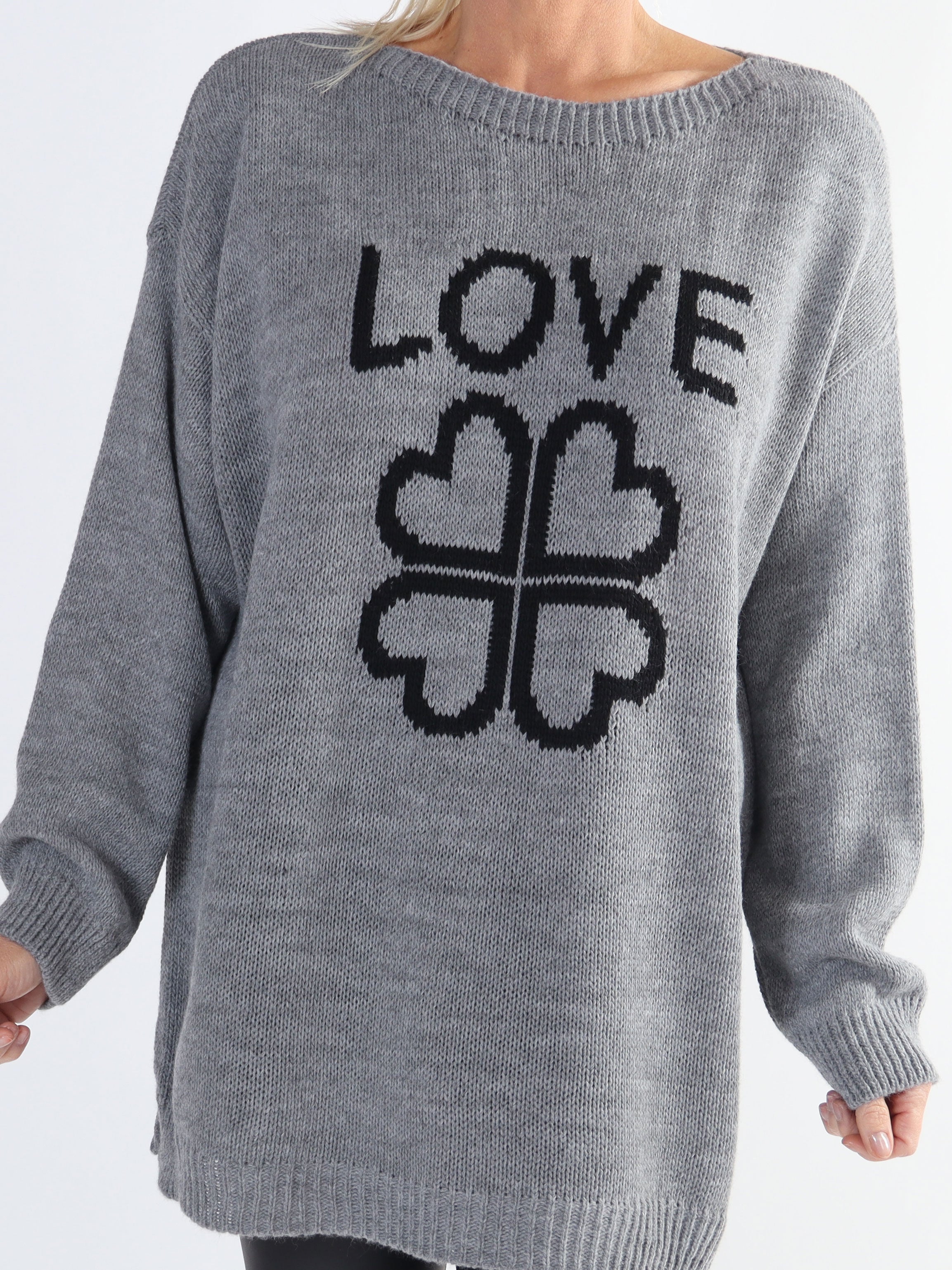 Mia - Stickad blus med fyrklöver i plus size-modell