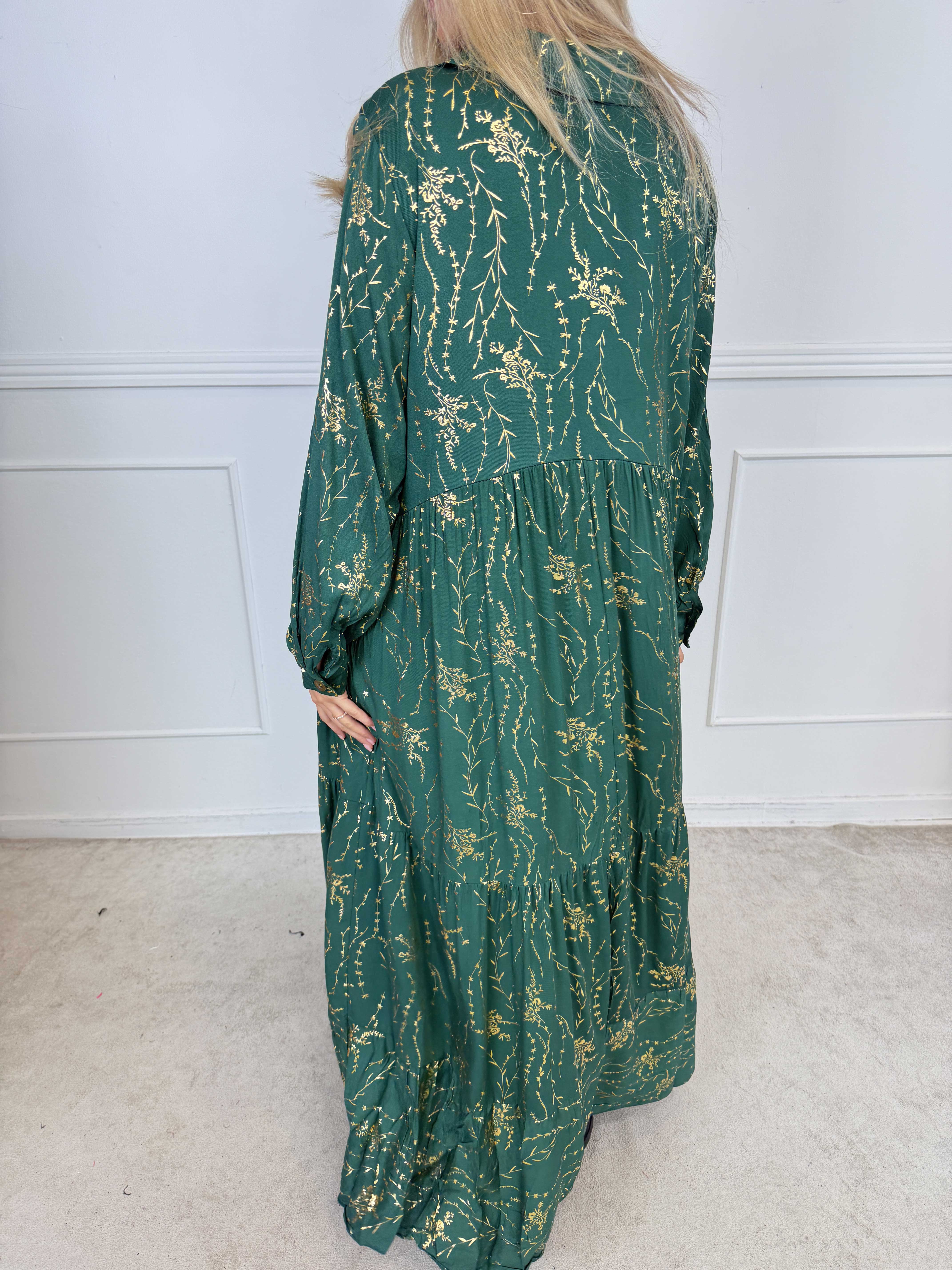 Mirabelle - Lång och elegant klänning i viskos med lager-på-lager-look och exklusivt guldtryck