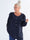 Nicola - Söt plus size blus med volanger och knappar