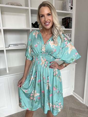 Pams Fly Short - Elastisk klänning med blommor och fåglar