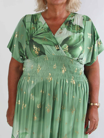 Pams Big Lily - Elastisk plus size kjole med store liljer og guld detaljer