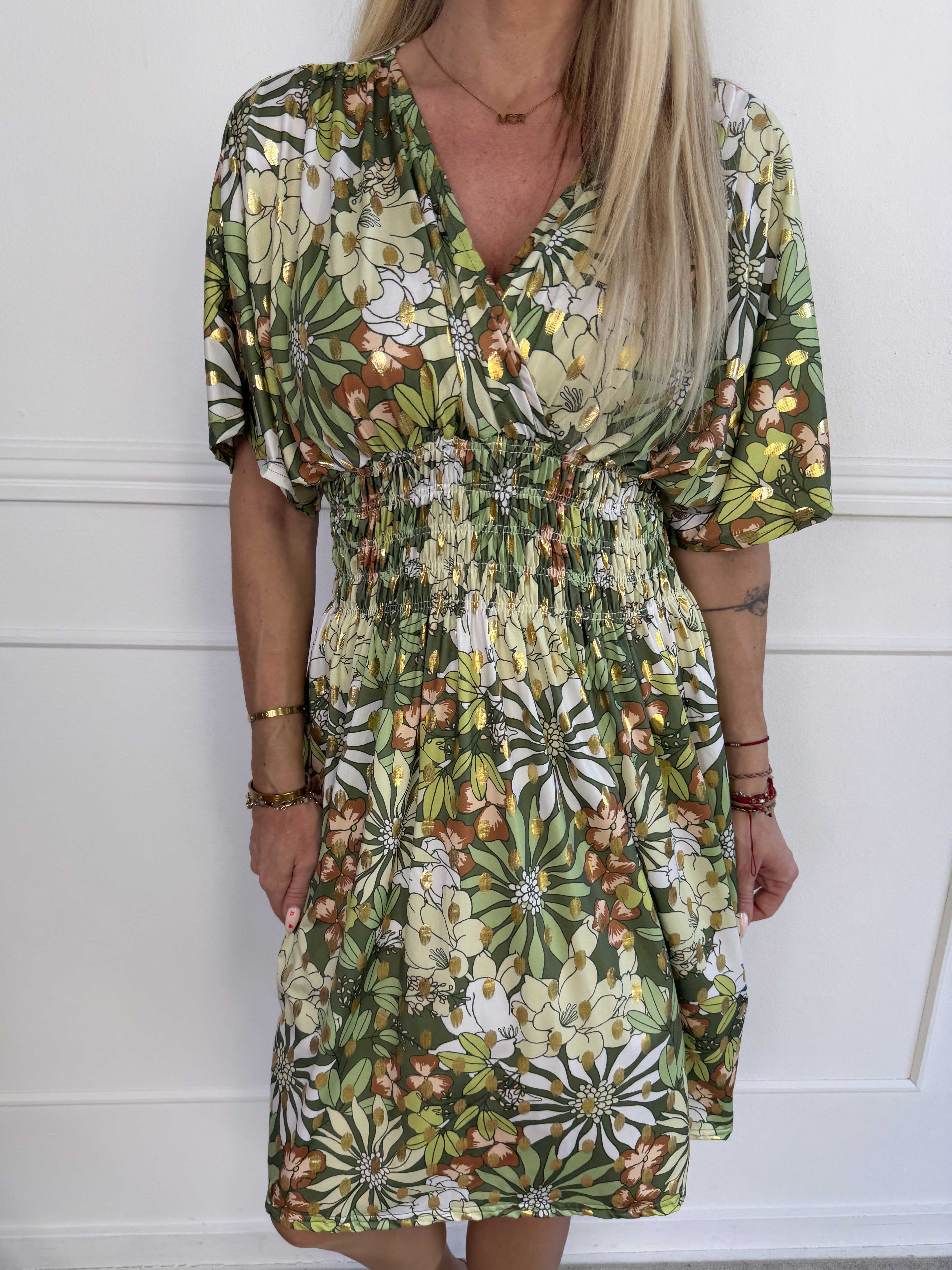 Pams Bloomfall Short - Elastisk kjole med blomstermotiver og guld dutter