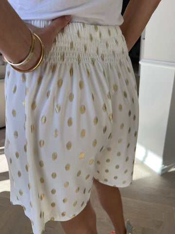 Pams Dot Shorts - Löst sittande shorts i stretchigt tyg med guldprickar