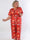 Pams Holiday Jumpsuit - Elastisk jumpsuit i plusstorlek med julmotiv
