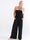 Pams Plain Tube Jumpsuit - Elastisk jumpsuit i plusstorlek med smock vid bröstet