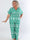 Pams Snow Jumpsuit - Elastisk jumpsuit i plusstorlek med jultryck