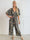 Pams Tribal Jumpsuit - Elastisk mønstret buksedragt med små guld blomster
