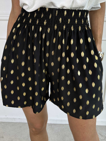 Pams Dot Shorts - Löst sittande shorts i stretchigt tyg med guldprickar