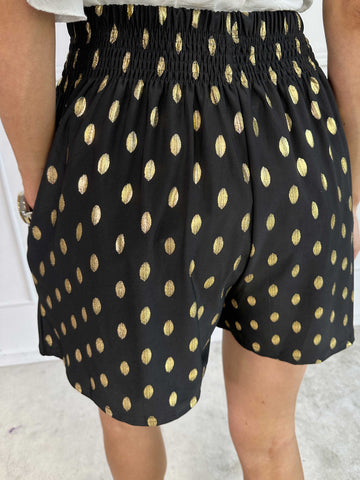 Pams Dot Shorts - Löst sittande shorts i stretchigt tyg med guldprickar
