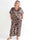 Pams Leafage Jumpsuit - Plus size jumpsuit i lövmönster med guldfärgade tofsar