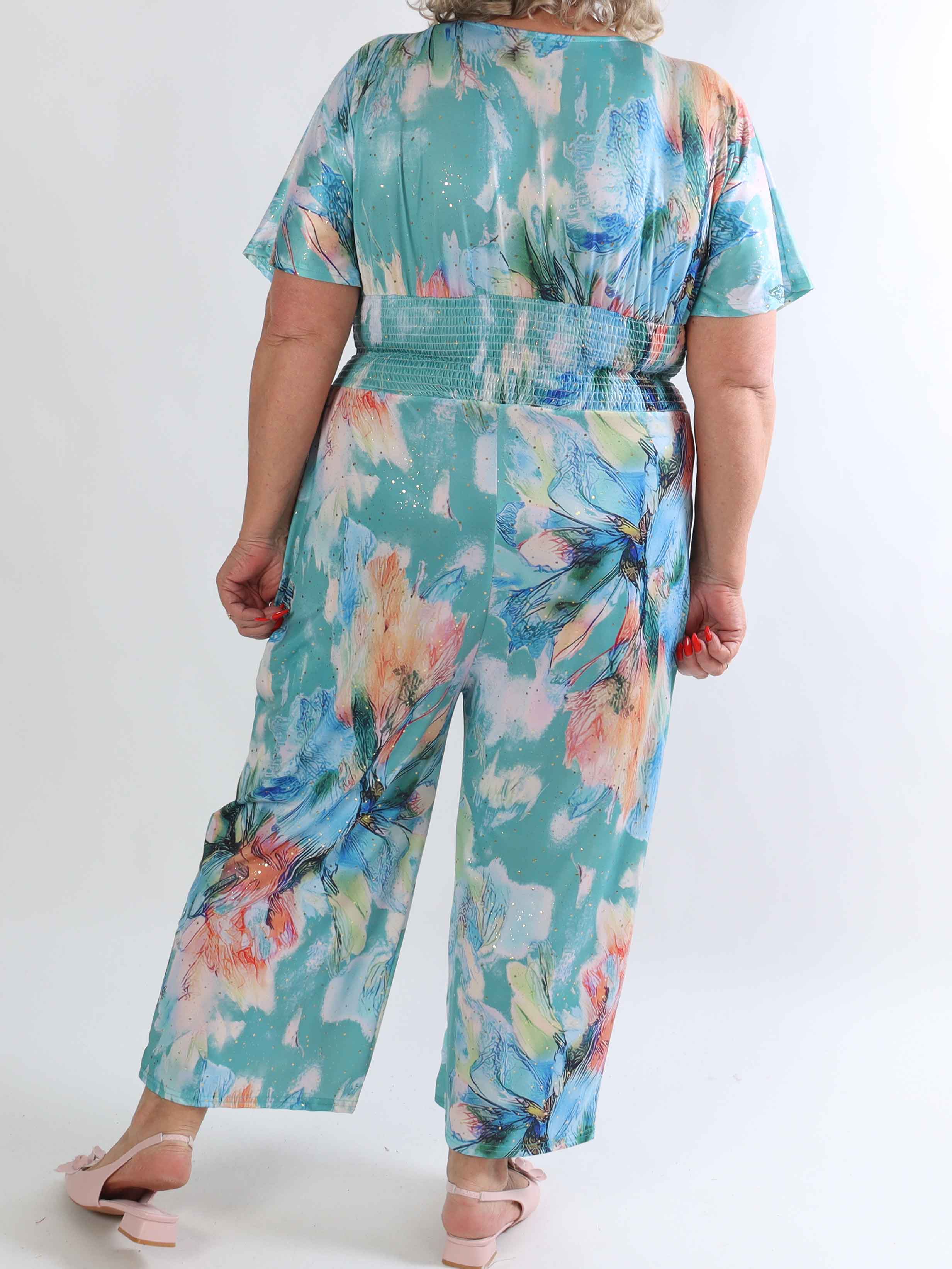 Pams Print Jumpsuit - Stretchig mönstrad plus size jumpsuit med guldfärgat damm