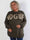 Priscilla - Stickad plus size tröja med VOGUE skrivet i guldglittertråd