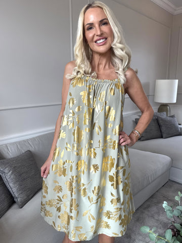 SunLove Gold Flower - Klänning med elastiskt band och stora blad i guld